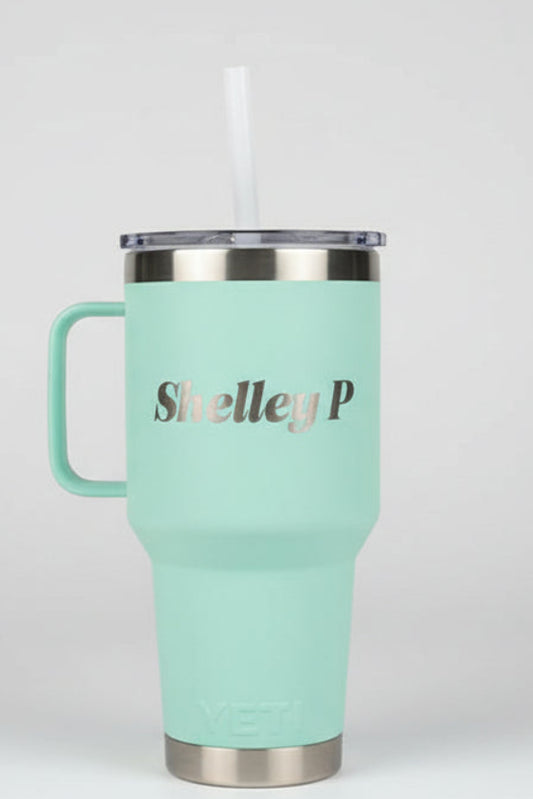 Light green Yeti mug with 'Shelley P' engraved on it,