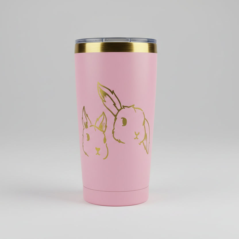 Pink tumbler with gold design