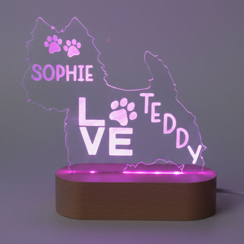 LED light with silhouette of a dog and text 'SOPHIE LOVE TEDDY' on a purple background