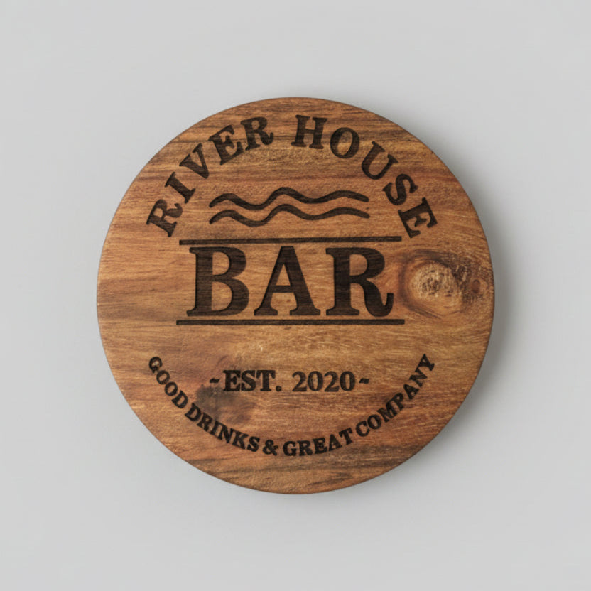 Wooden coaster with 'River House Bar' engraving 