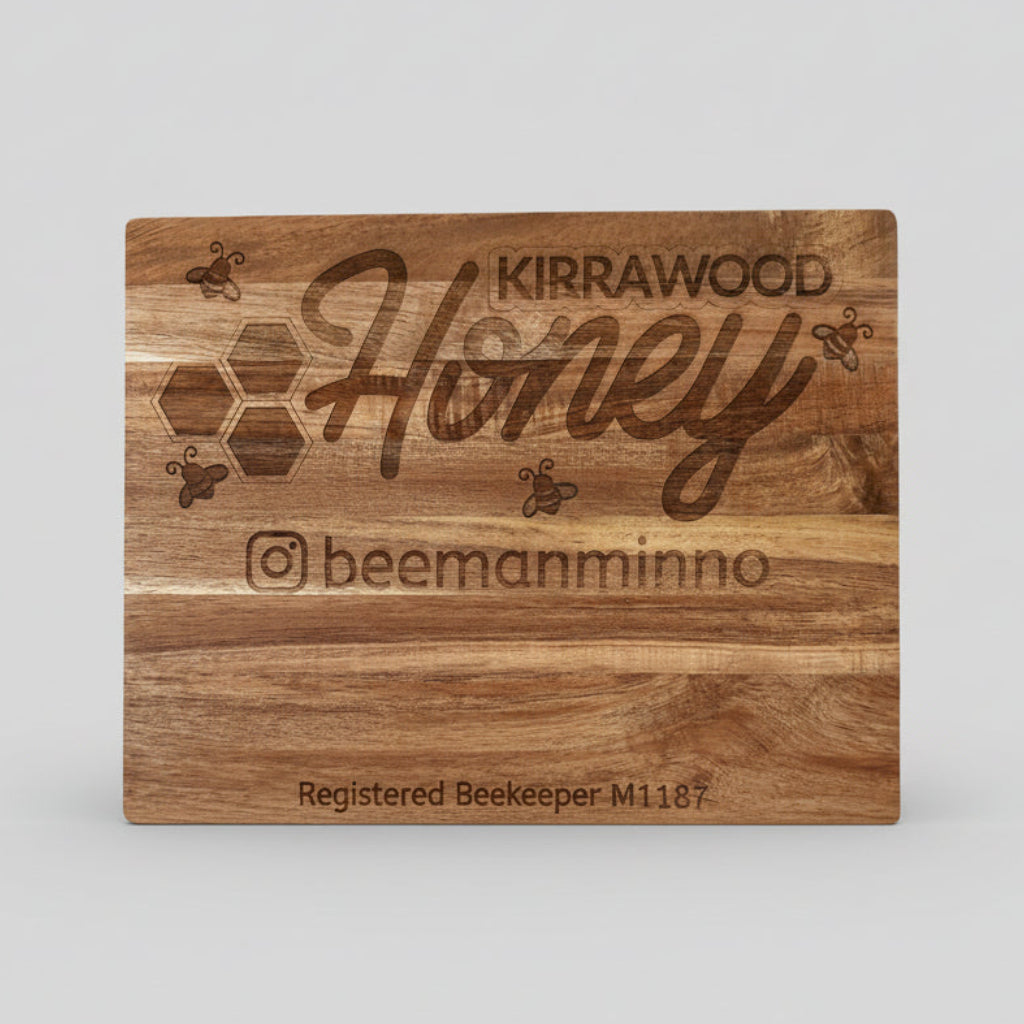 Wooden sign with 'Kirrawood Honey' branding on a gray background