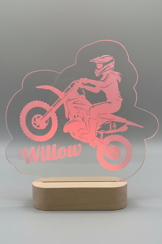 Red motorcycle-shaped sign with 'Willow' 