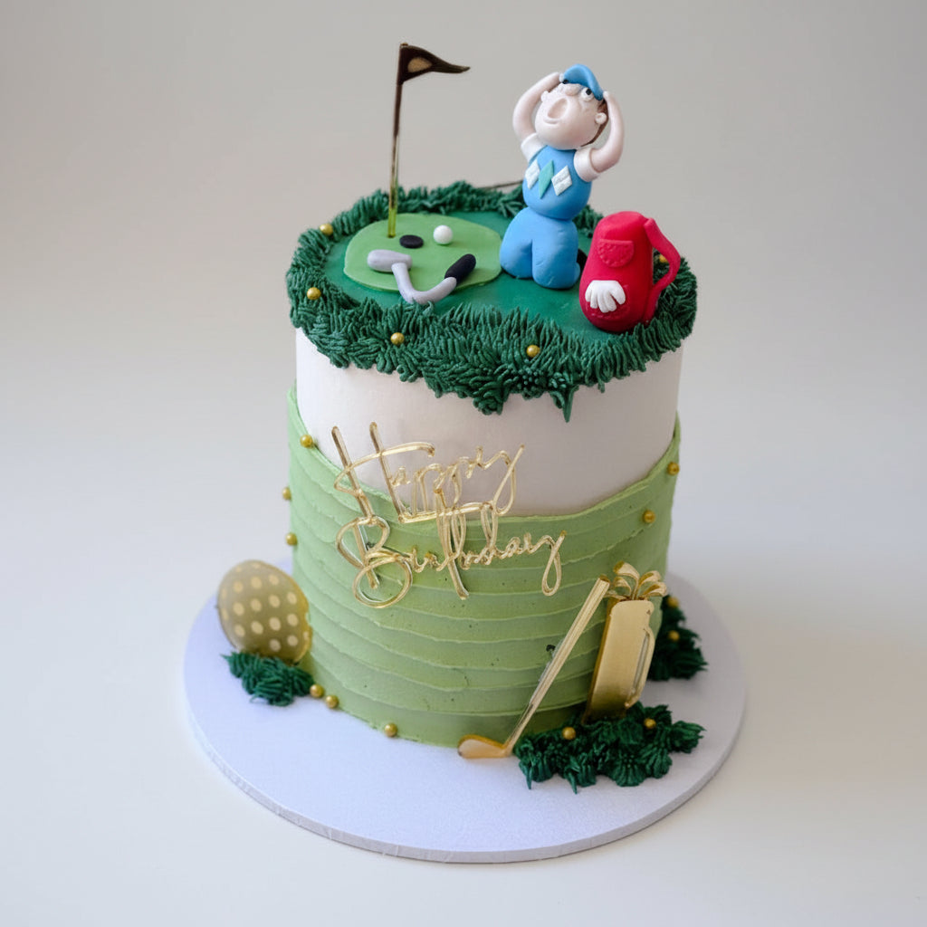 Birthday cake with golf-themed decorations including a golfer figurine, golf club, and ball.