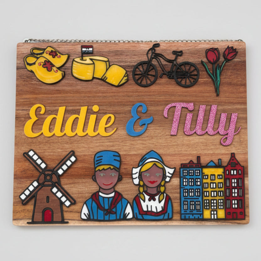 Wooden sign with colorful illustrations cut from acrylic and text