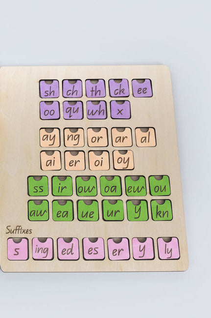 Two educational boards with letter tiles.