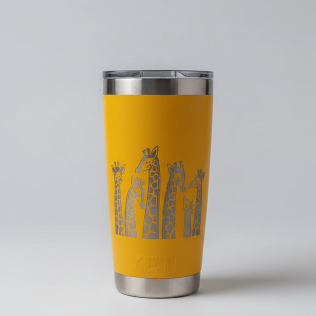 Yellow Yeti tumbler with giraffe design 